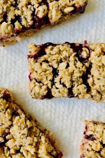 four berry bars on a white background