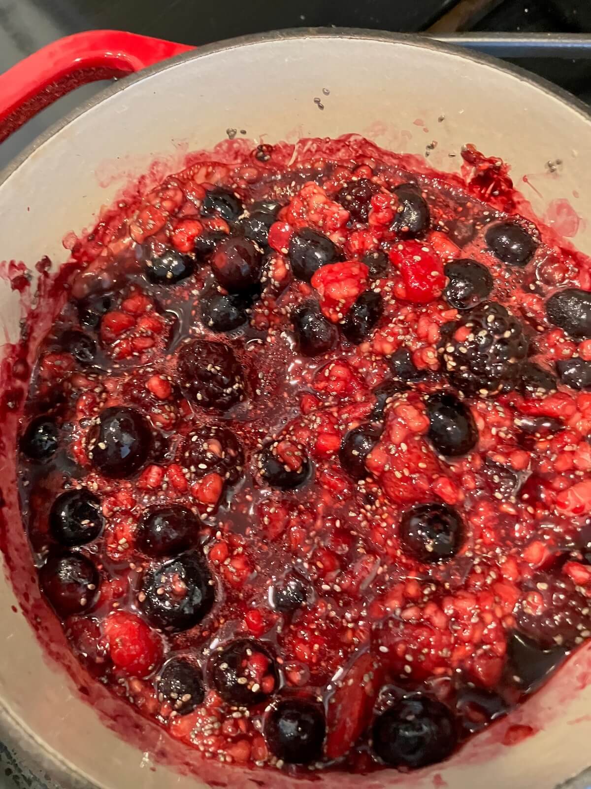 berries cooking in a pot on the stove